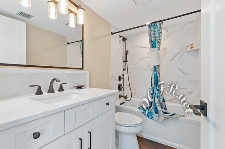 Guest Bathroom with Tub Shower and Hand Shower