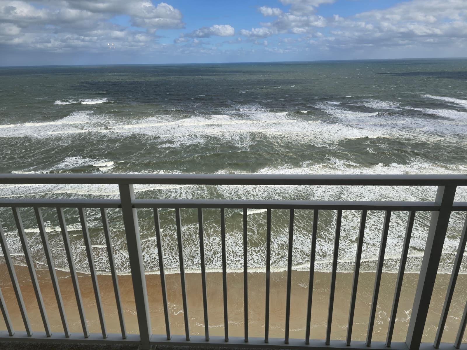 Oceanfront balcony table with seating for 5
