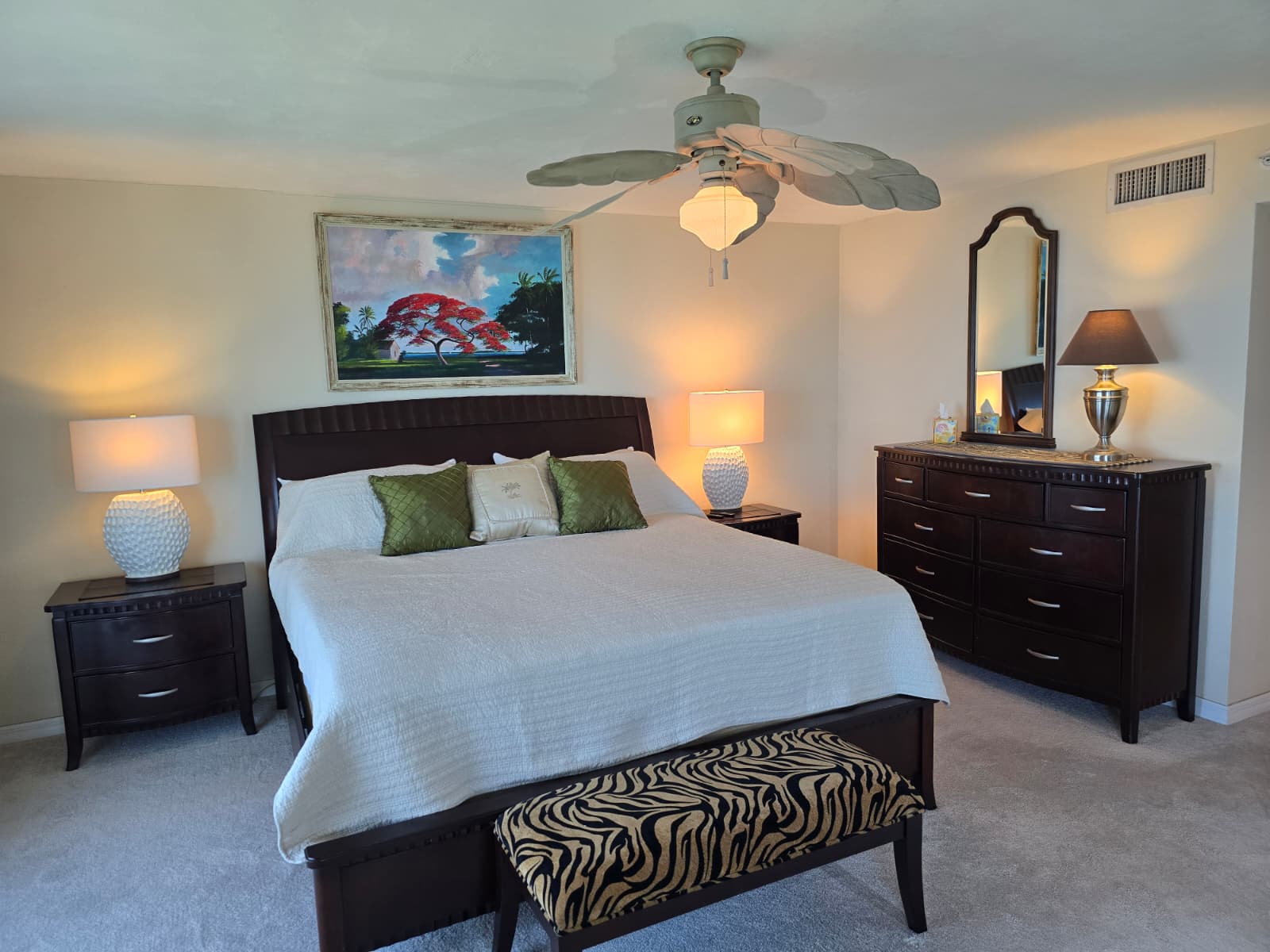 Bedroom 1 with king-size bed, dresser and bed side tables